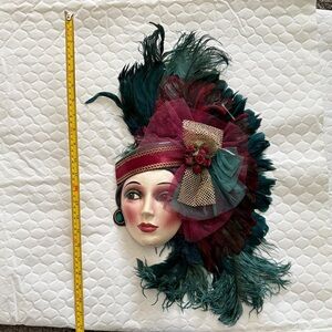Elegant Feathered Mask with Burgundy and Teal Accents